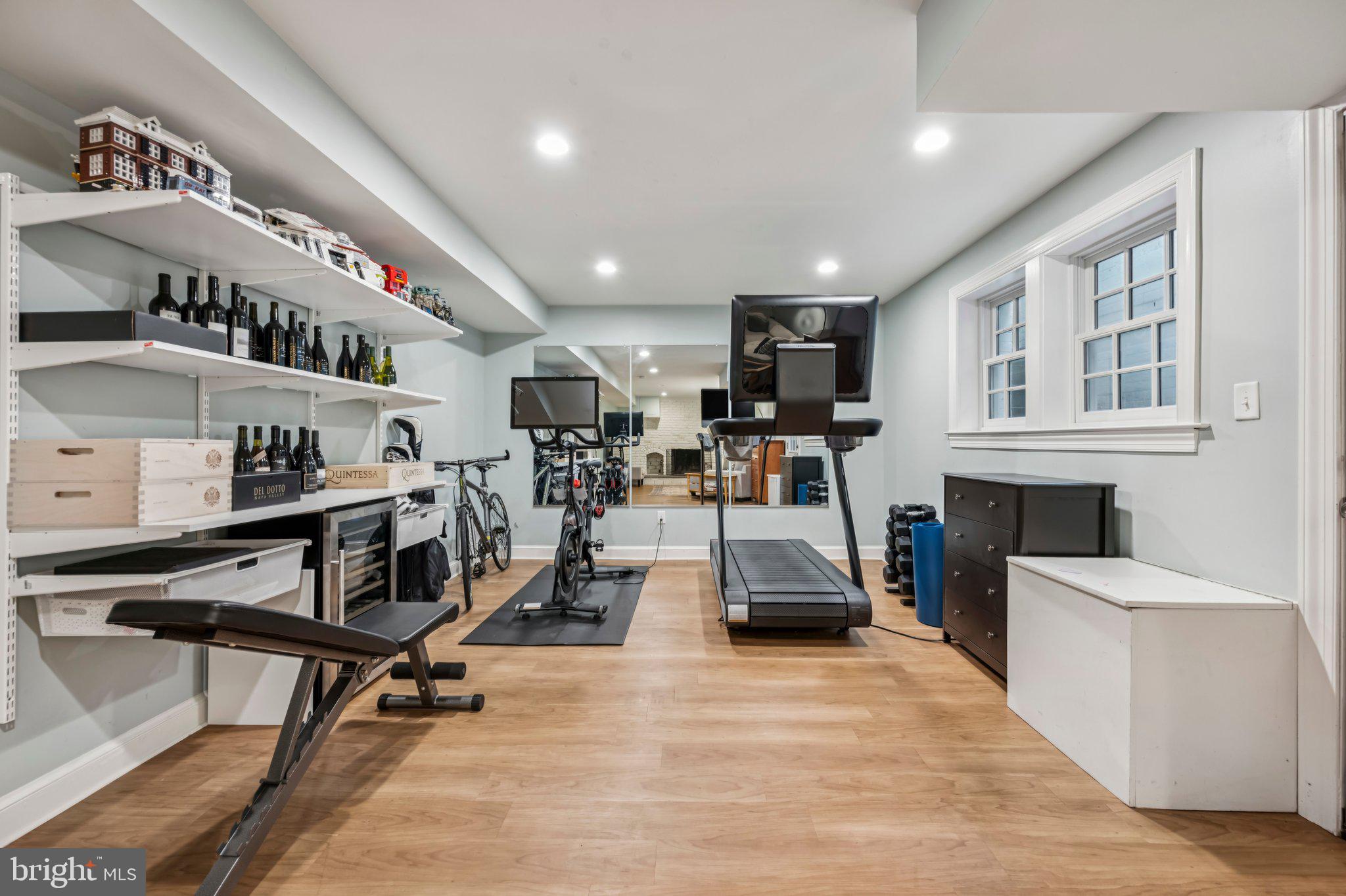 5109 River Hill Road Bethesda, MD 20816 - Photo 17 of 21 a living room with lots of furniture and a wooden floor