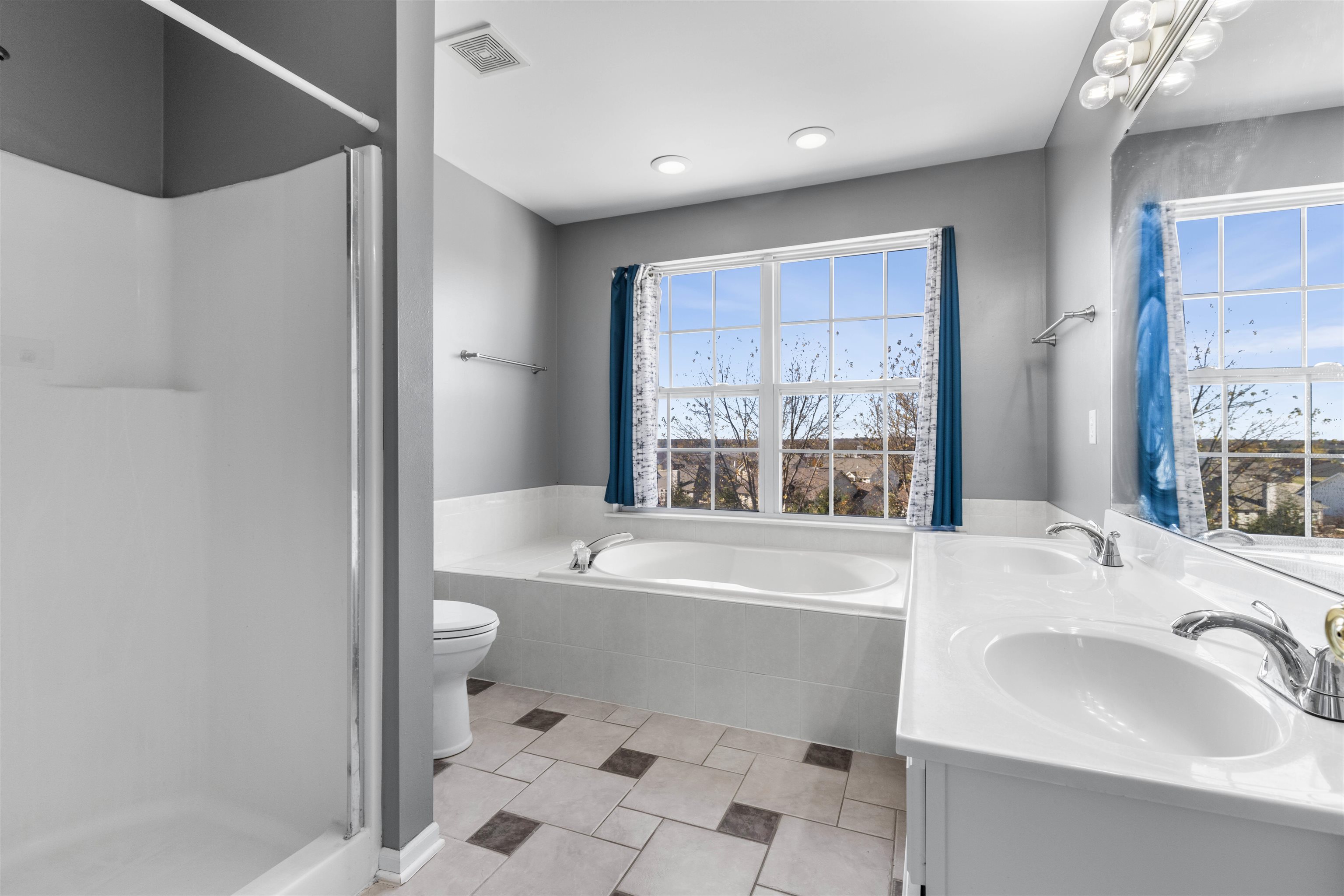 9360 Corriedale Run Roscoe, IL 61073 - Photo 14 of 34 a bathroom with a sink toilet and shower