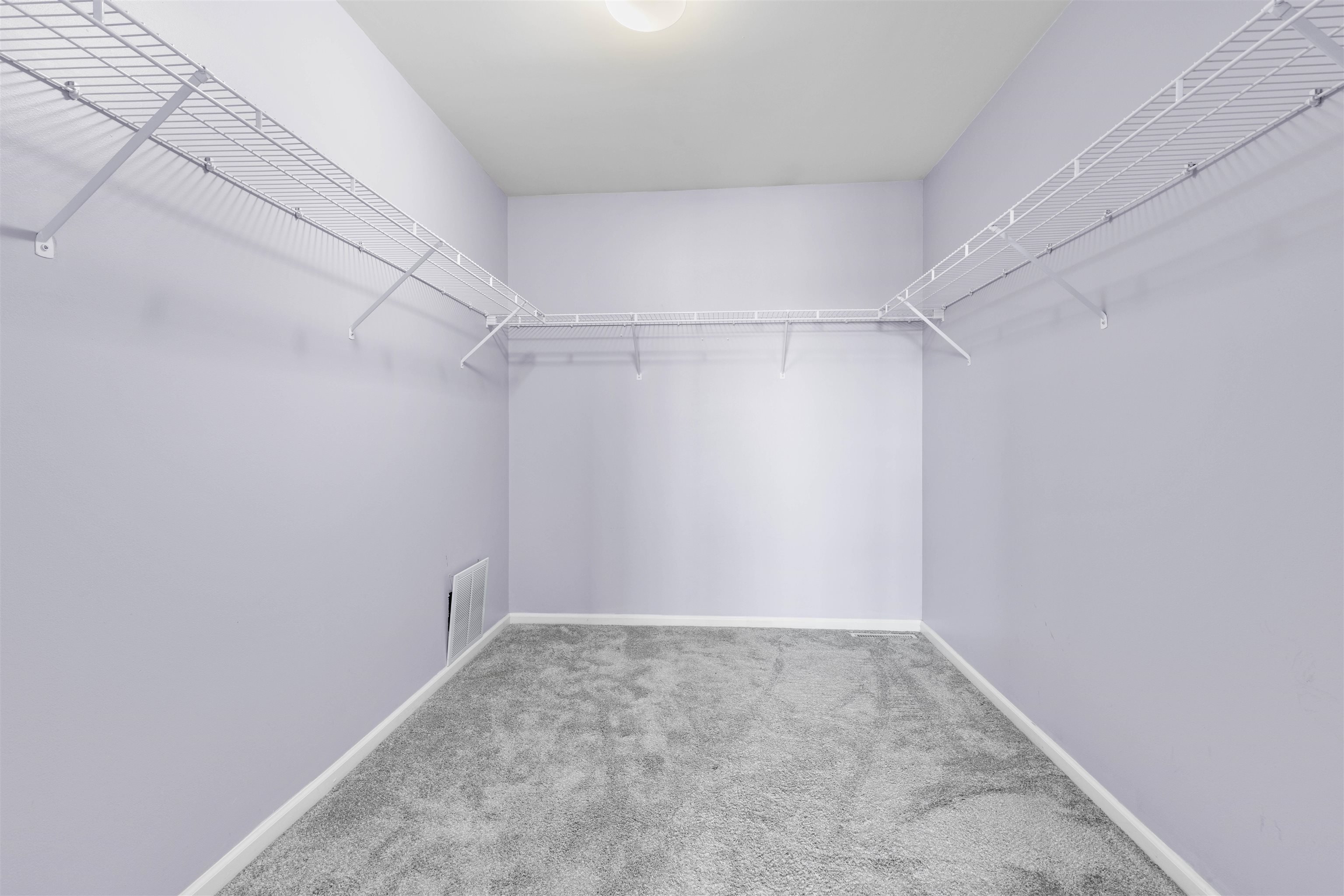 9360 Corriedale Run Roscoe, IL 61073 - Photo 16 of 34 a view of a room with racks on the wall
