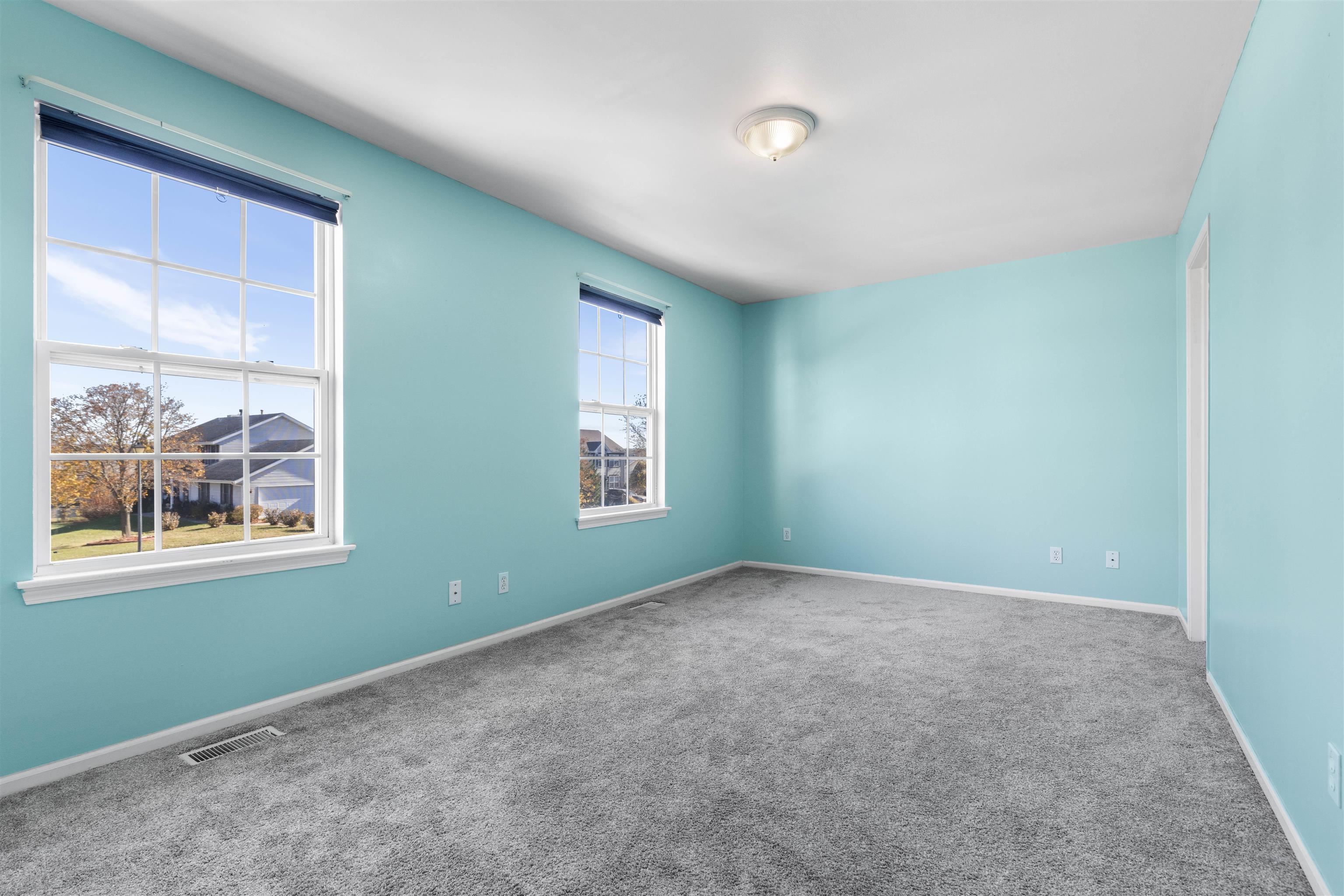 9360 Corriedale Run Roscoe, IL 61073 - Photo 18 of 34 an empty room with windows