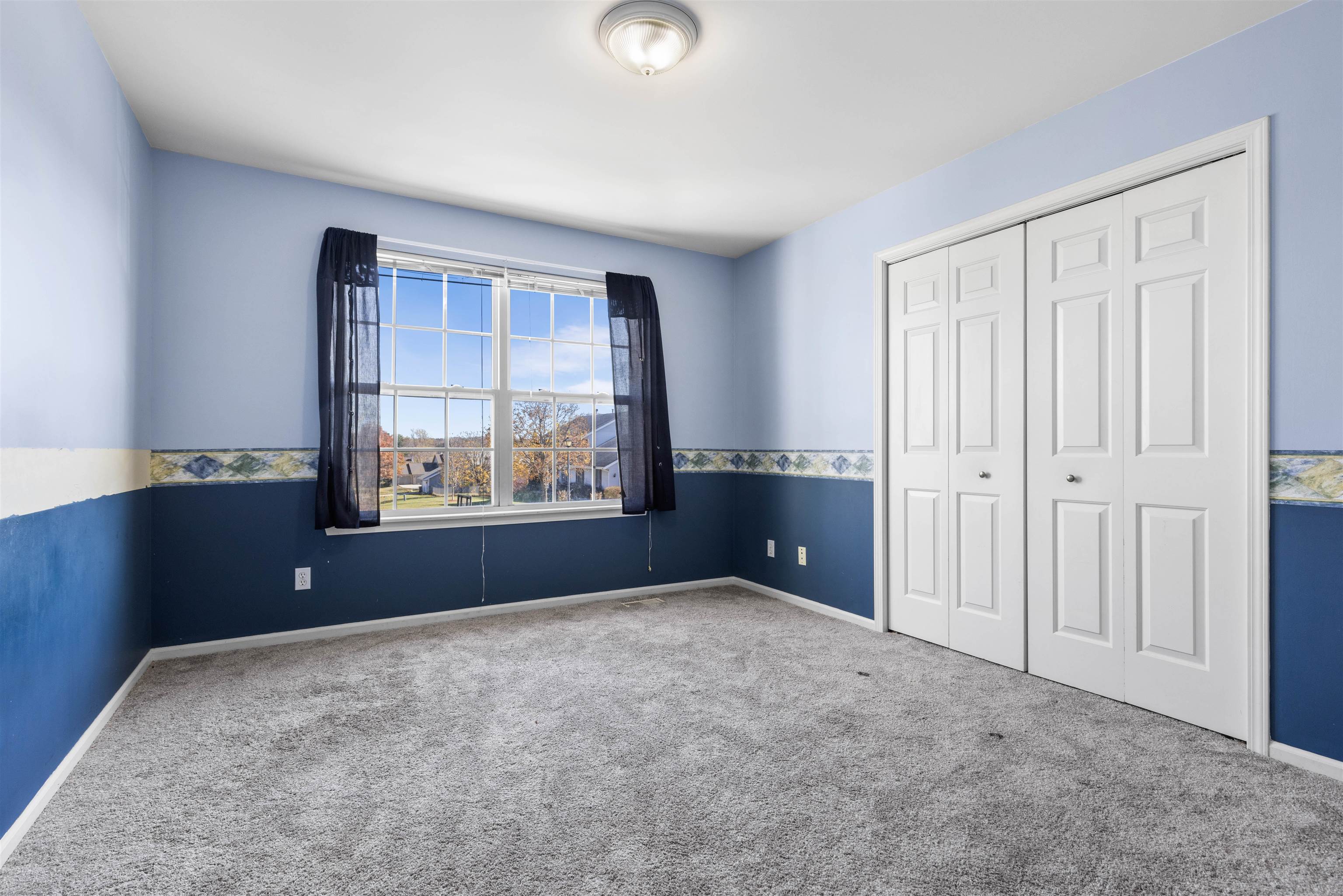 9360 Corriedale Run Roscoe, IL 61073 - Photo 21 of 34 an empty room with windows and closet