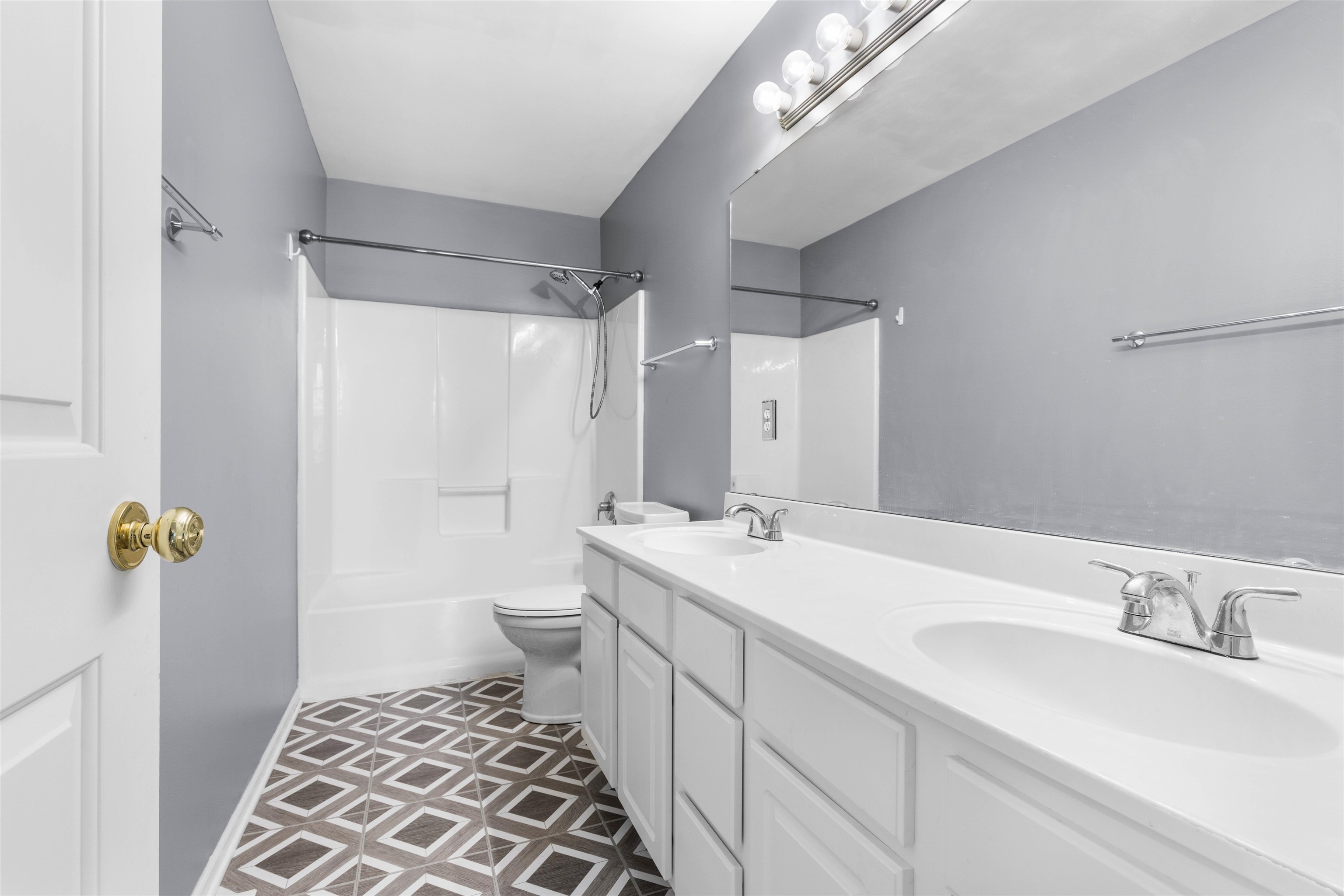 9360 Corriedale Run Roscoe, IL 61073 - Photo 24 of 34 a bathroom with a sink a toilet and shower