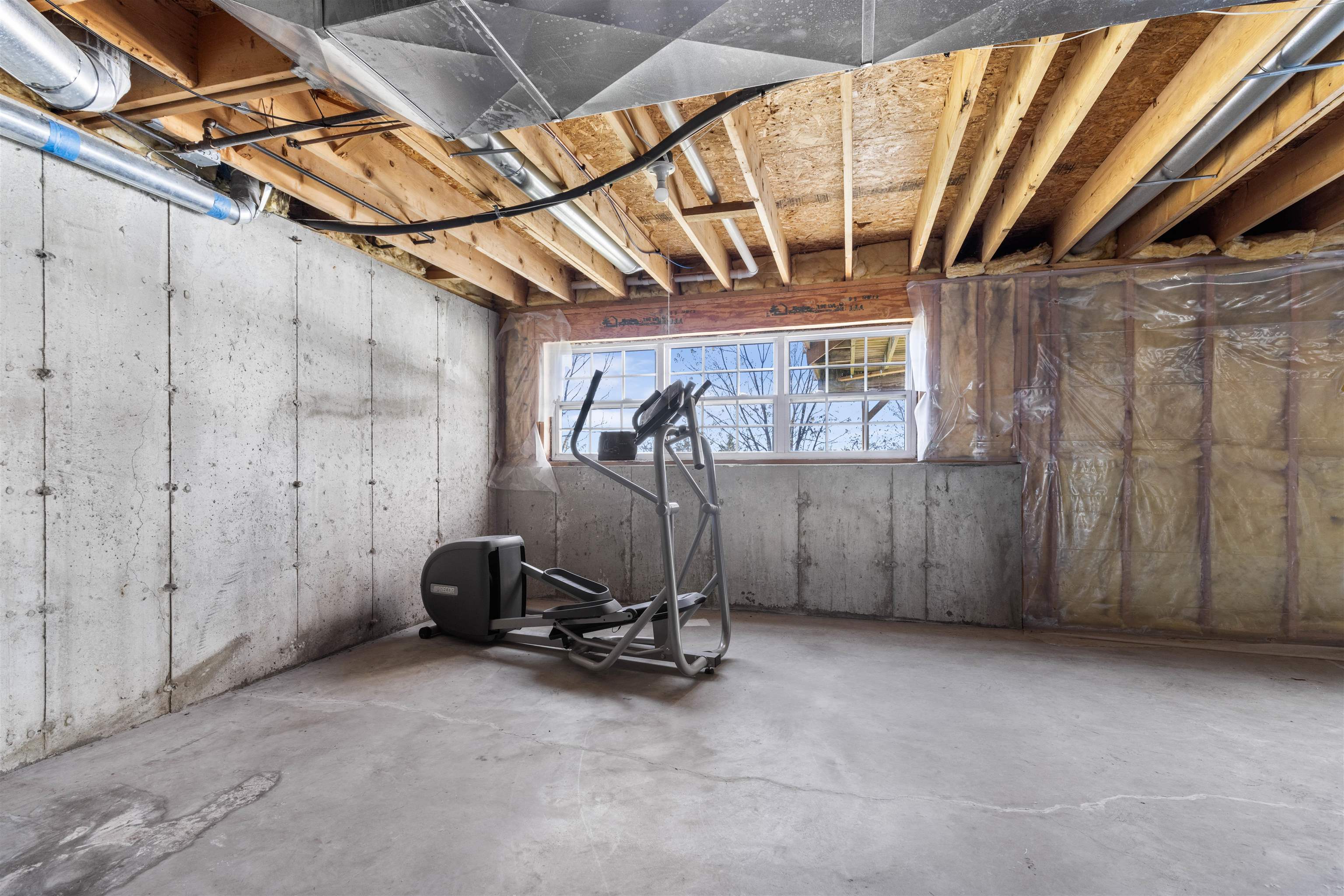 9360 Corriedale Run Roscoe, IL 61073 - Photo 26 of 34 a view of a room with gym equipment