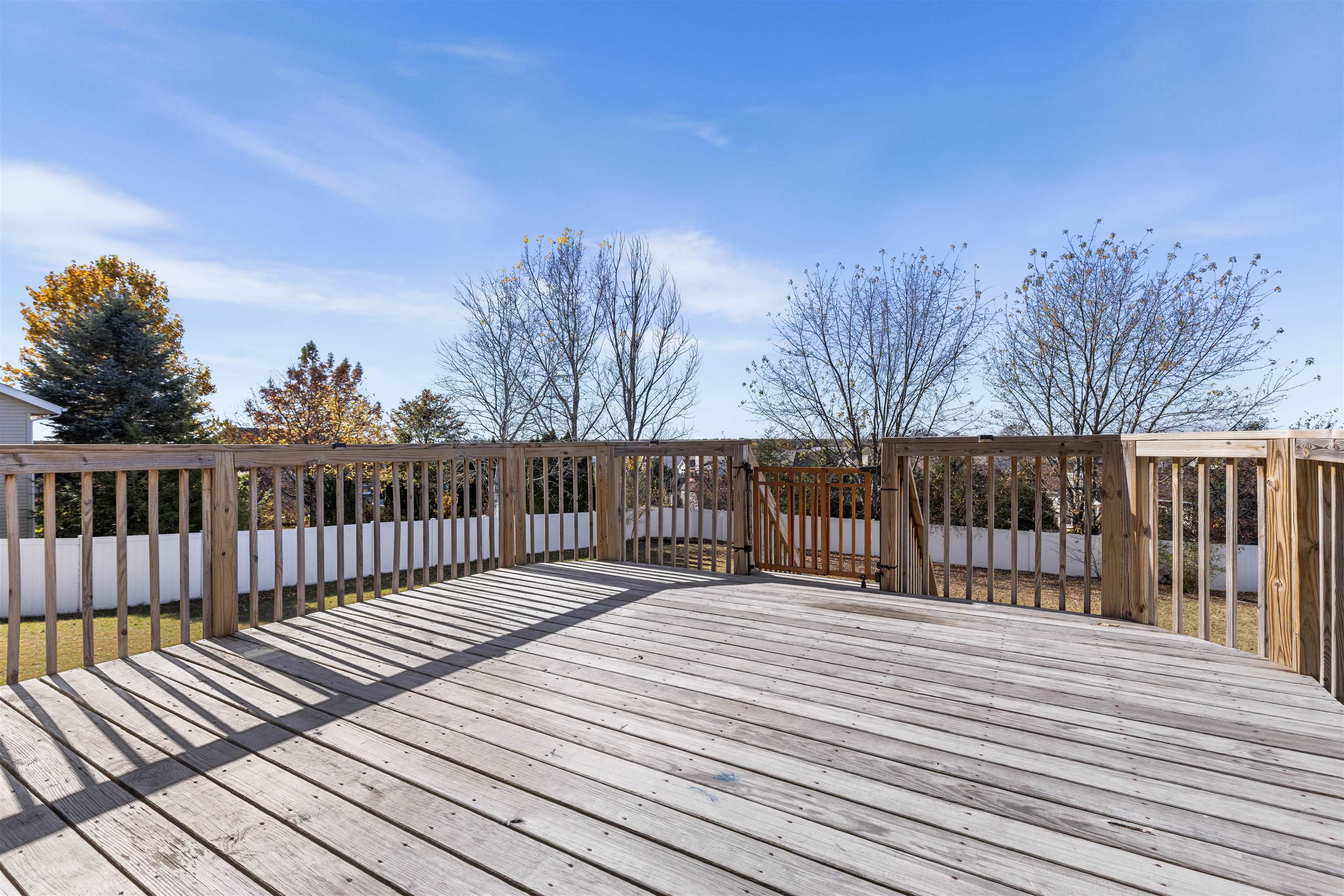 9360 Corriedale Run Roscoe, IL 61073 - Photo 29 of 34 a balcony with wooden floor and fence