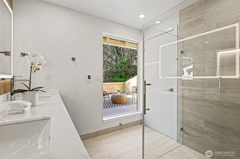 a bedroom with a bed and a fireplace