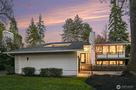 an aerial view of a house with outdoor space