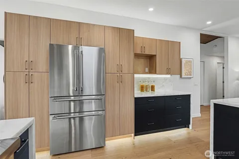 a kitchen with a stove and a sink
