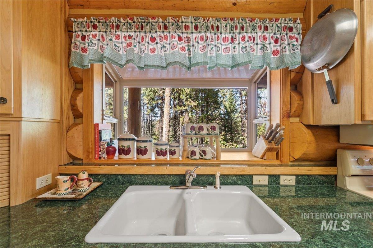 3725 Rim Road New Meadows, ID 83654 - Photo 18 of 50 Kitchen featuring a sink and white range oven