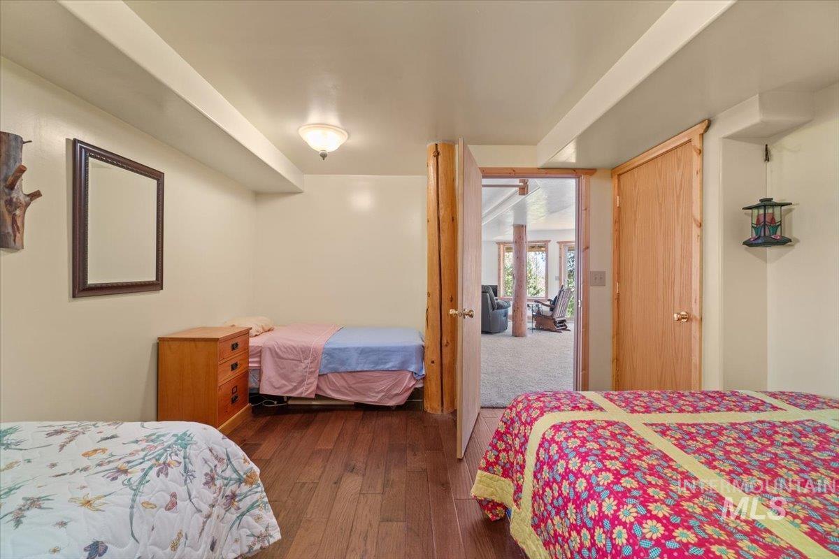 3725 Rim Road New Meadows, ID 83654 - Photo 36 of 50 Bedroom featuring dark wood-style flooring