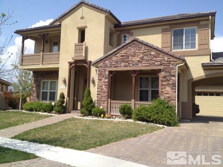 2655 Colmar Court Reno, NV 89521 - Photo 1 of 1 a front view of a house with garden