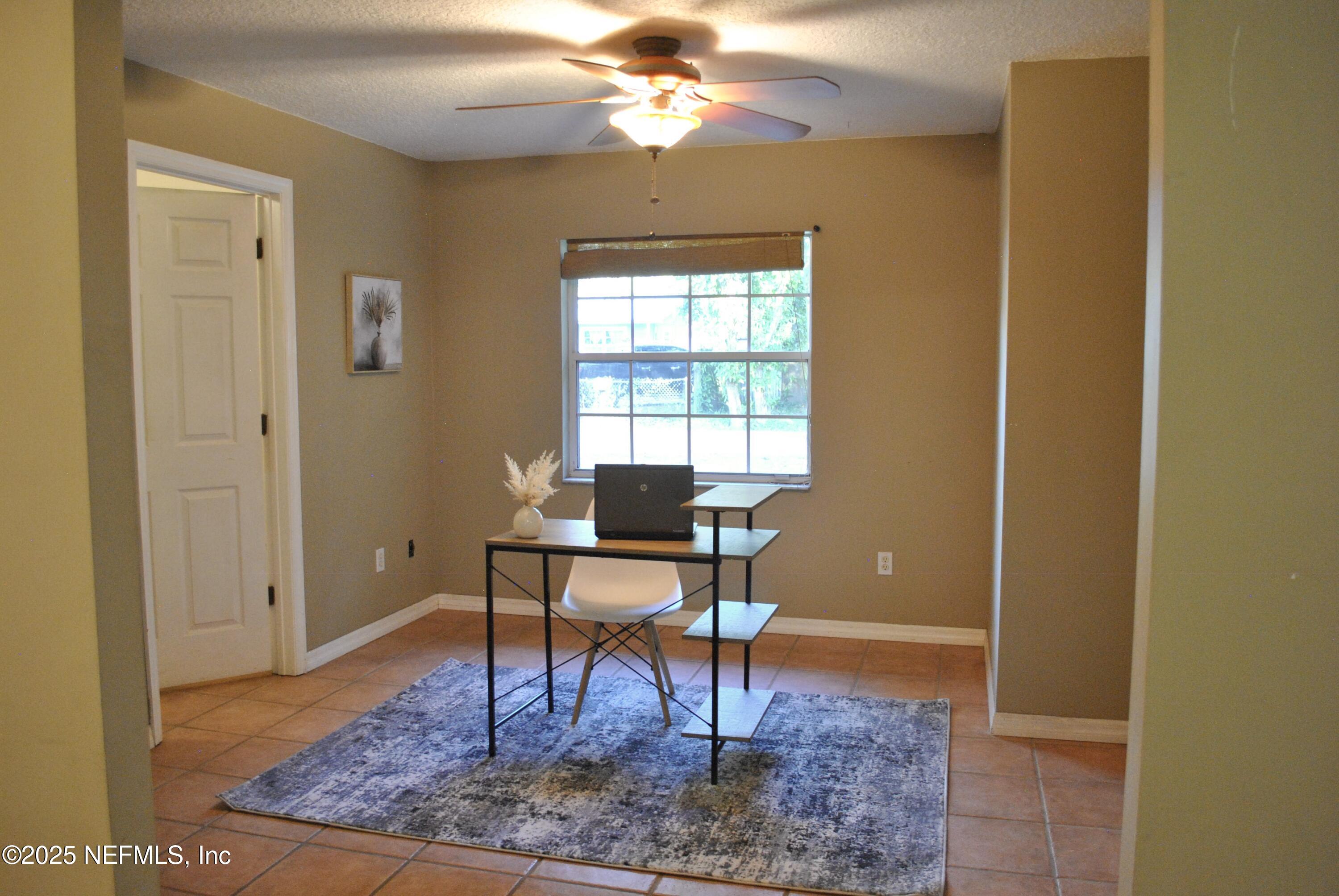 2819 North 6th Street St. Augustine, FL 32084 - Photo 12 of 18 a workspace room with furniture and window