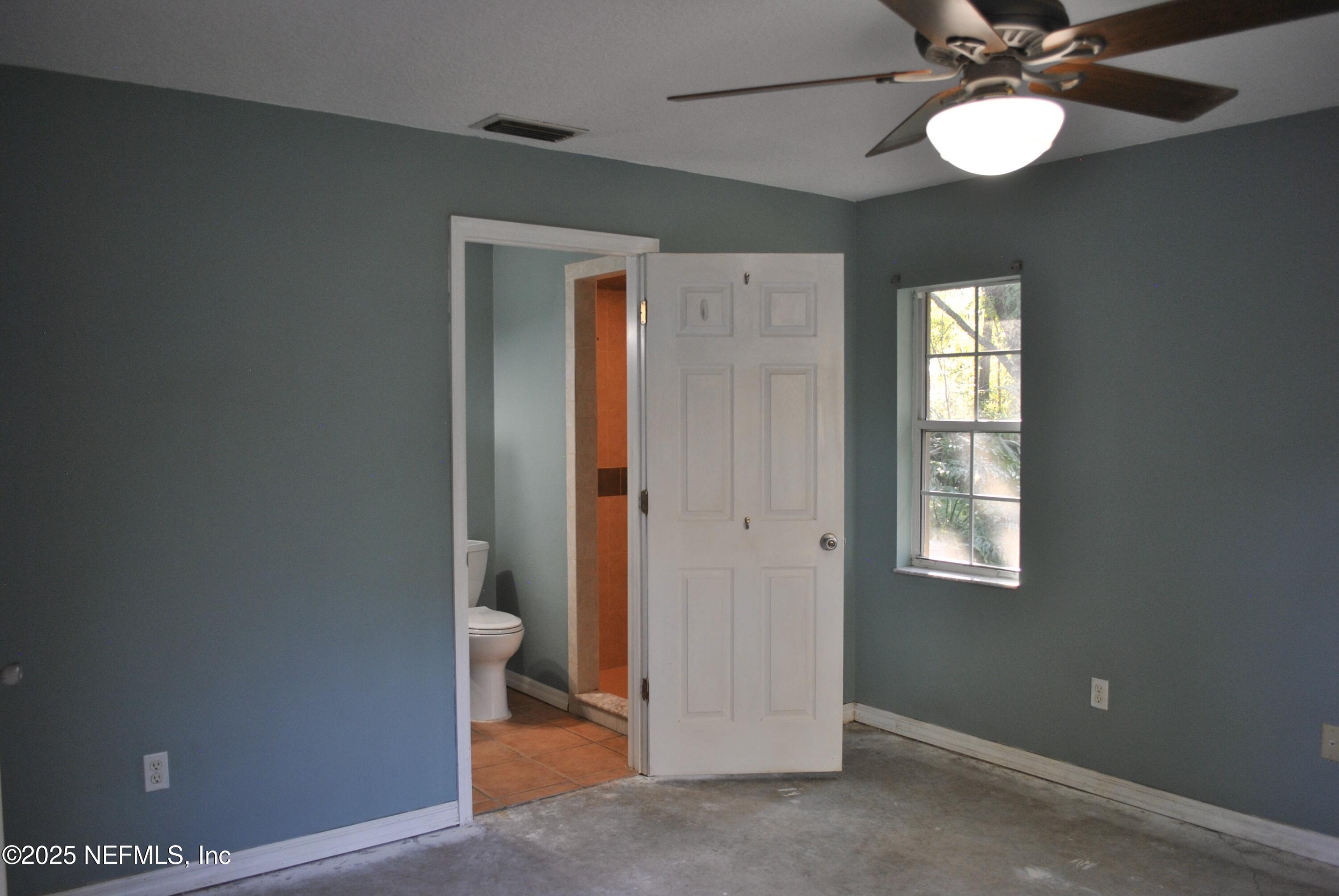 2819 North 6th Street St. Augustine, FL 32084 - Photo 15 of 18 a view of an empty room with a window