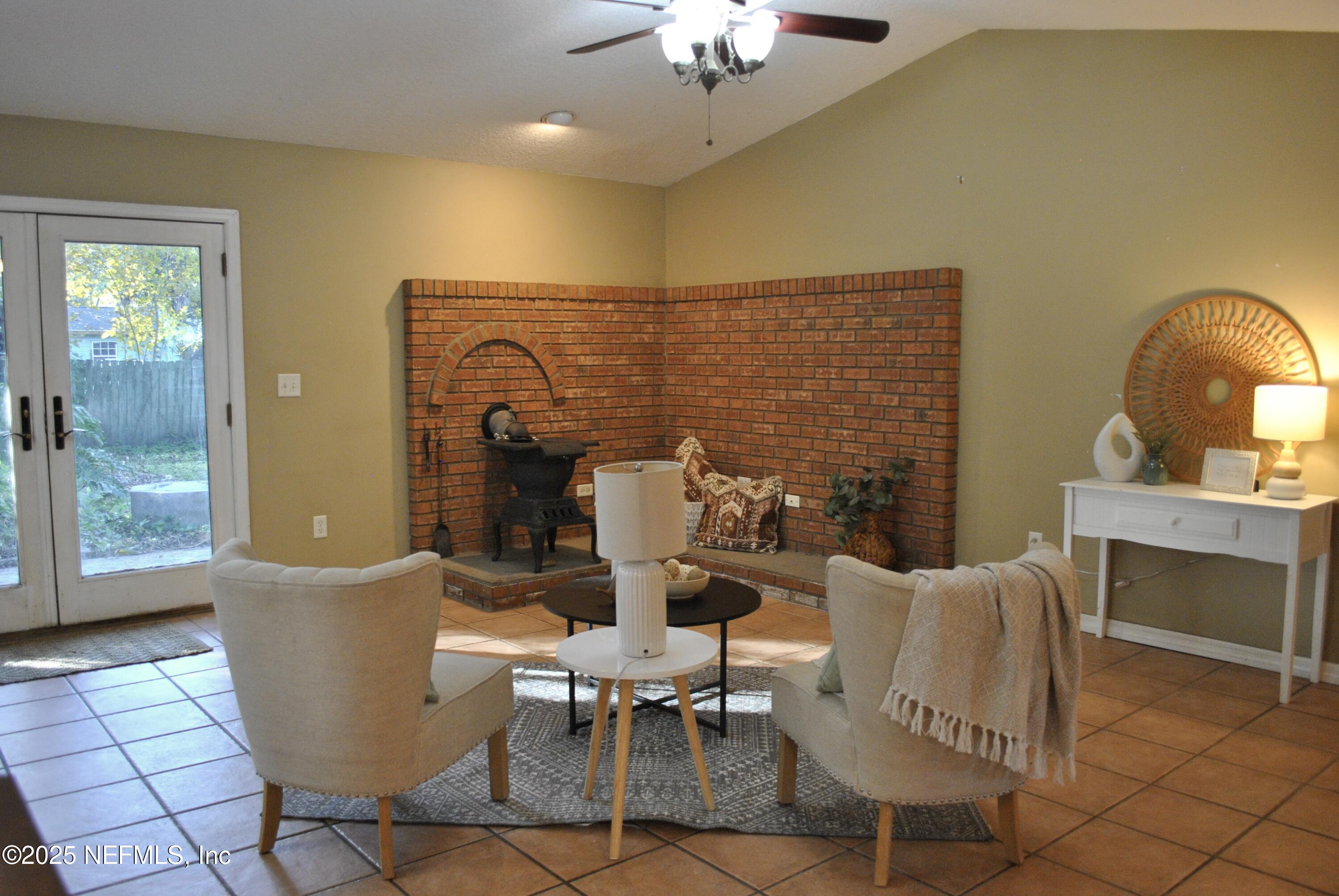 2819 North 6th Street St. Augustine, FL 32084 - Photo 9 of 18 a view of a dining room with furniture and chandelier