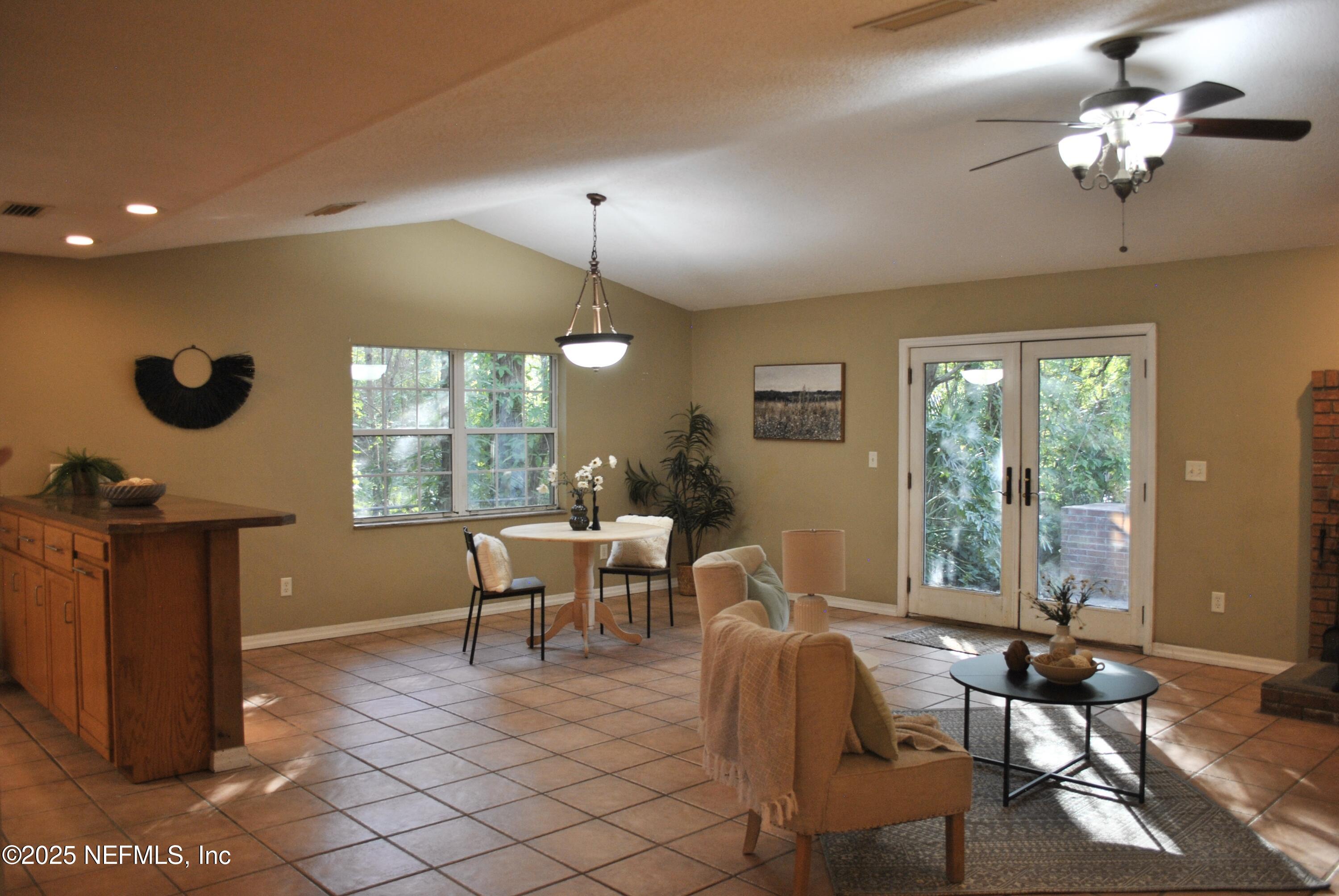 2819 North 6th Street St. Augustine, FL 32084 - Photo 10 of 18 a view of a dining room with furniture window and outside view
