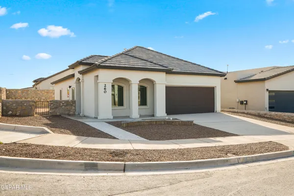 a view of entrance gate of a house