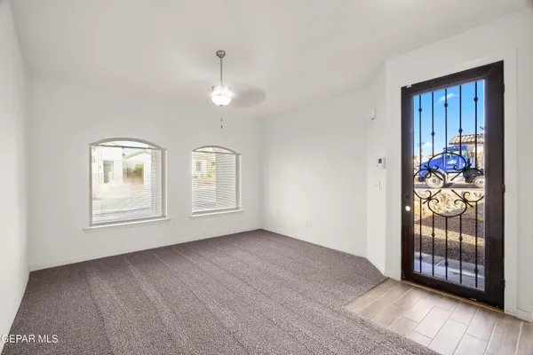 a view of a kitchen with wooden floor