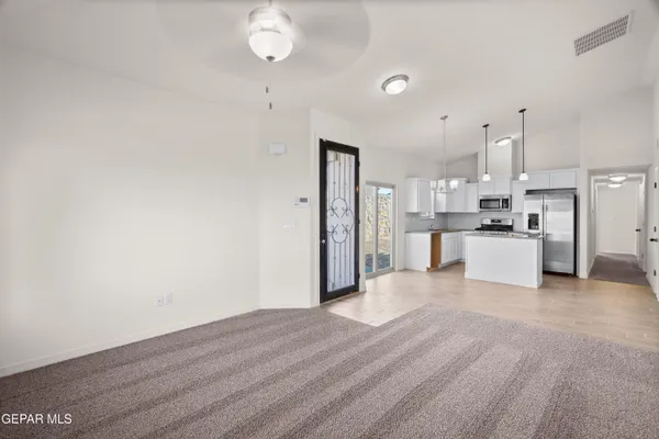 a view of kitchen with wooden floor