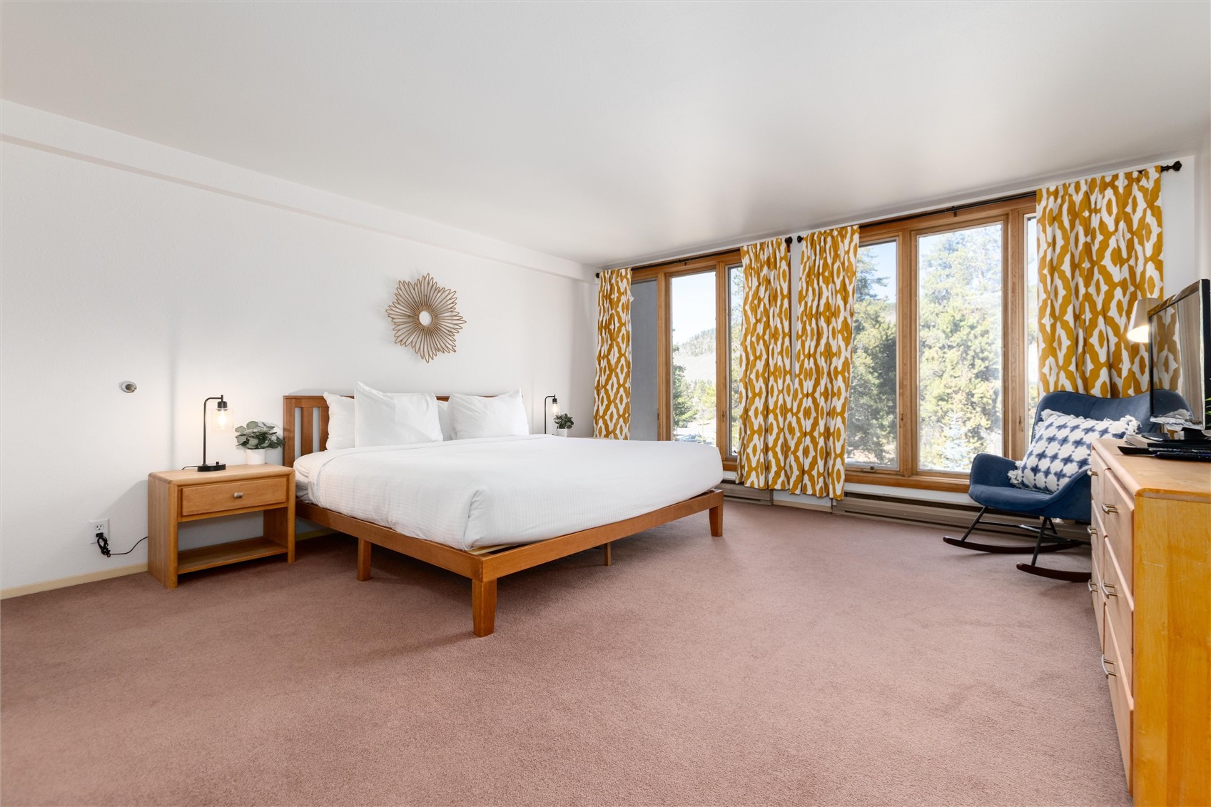 22340 Highway 6, Unit 1804 Keystone, CO 80435 - Photo 25 of 49 a bed sitting in a spacious bedroom next to a window