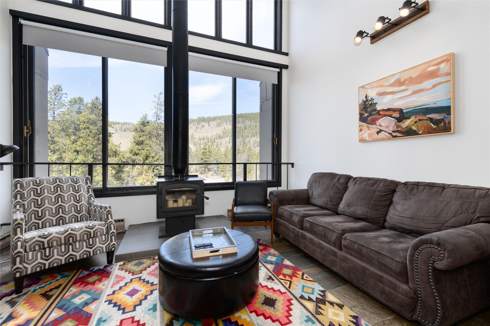 22340 Highway 6, Unit 1804 Keystone, CO 80435 - Photo 7 of 49 a living room with furniture and a large window