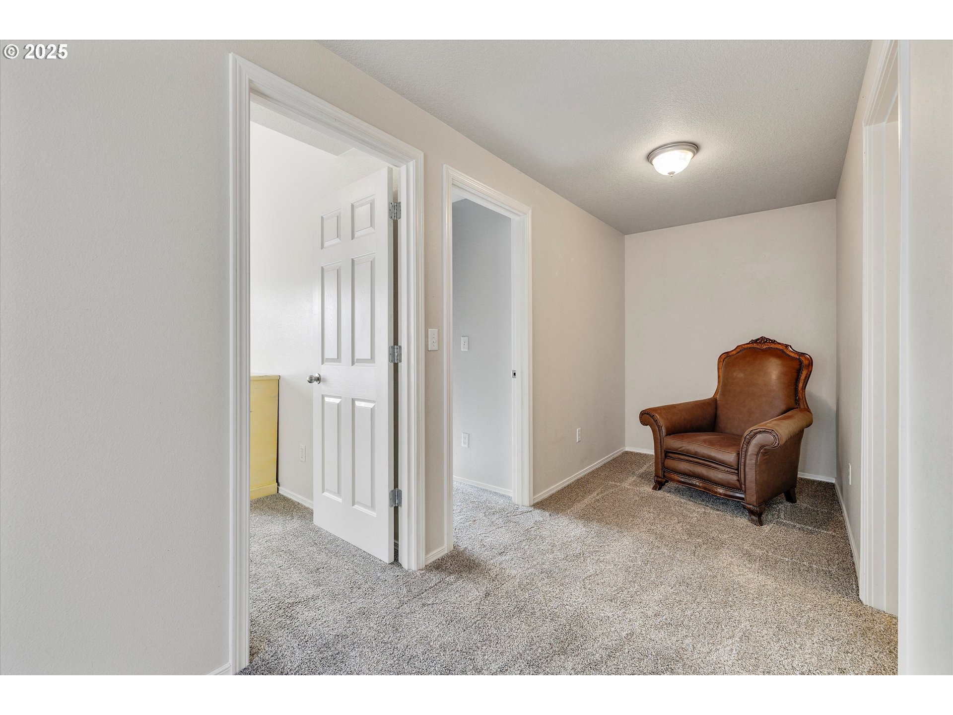 17645 Southwest Jay Street Beaverton, OR 97003 - Photo 15 of 31 a living room with furniture and a chair