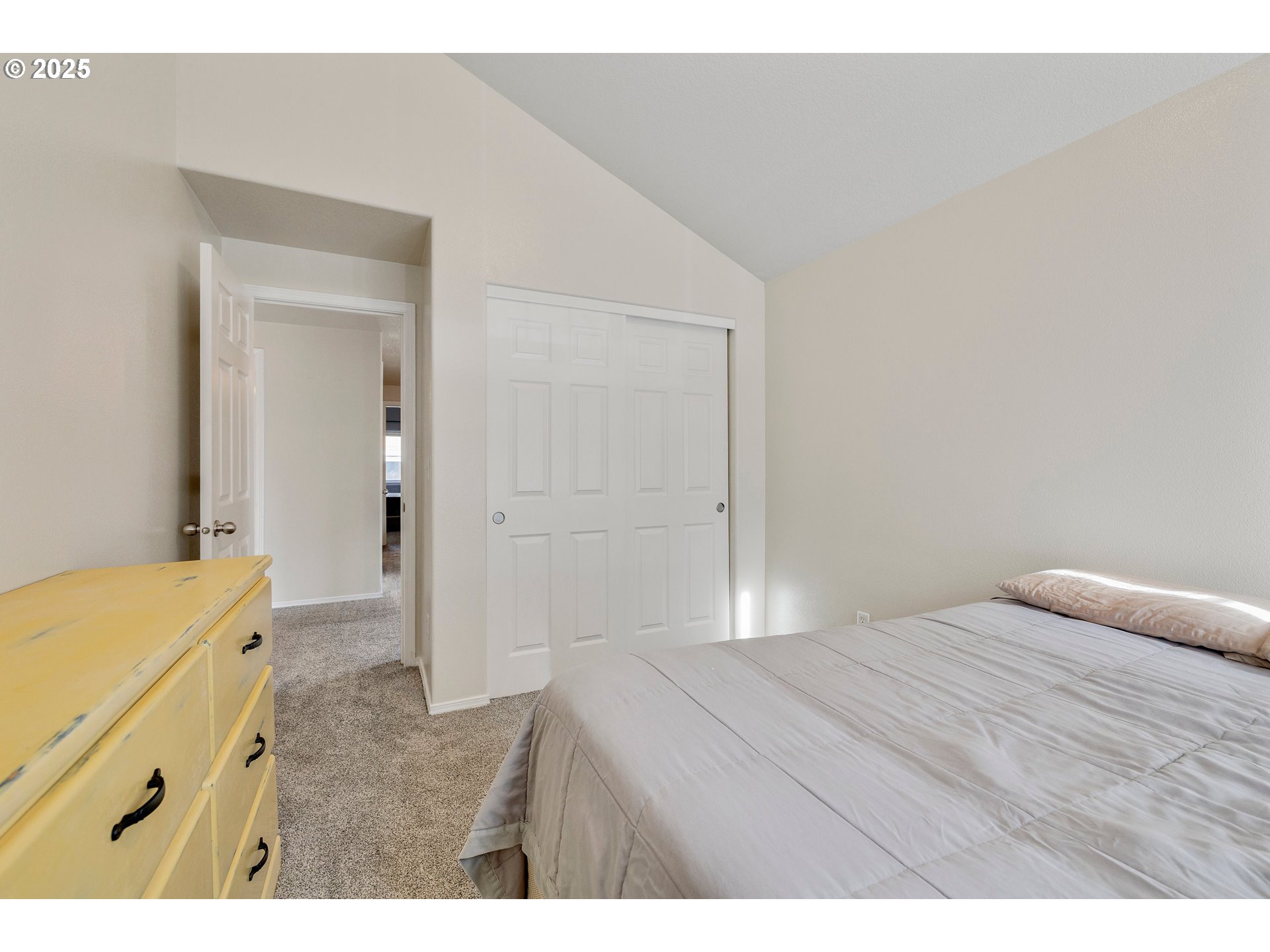 17645 Southwest Jay Street Beaverton, OR 97003 - Photo 21 of 31 a bedroom with a bed and a bathroom