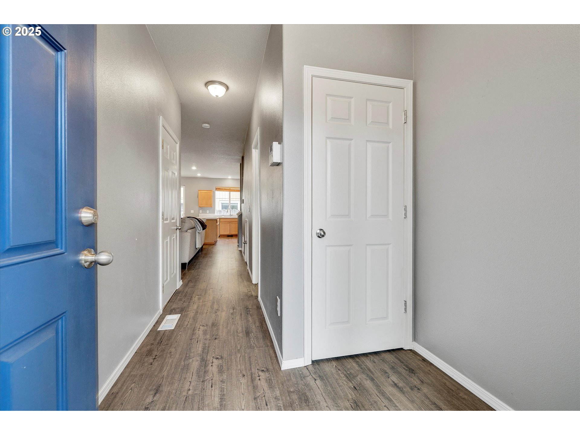 17645 Southwest Jay Street Beaverton, OR 97003 - Photo 4 of 31 a view of a room with wooden floor