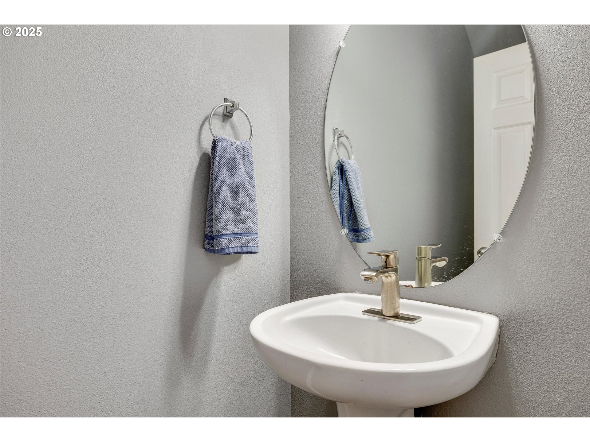 17645 Southwest Jay Street Beaverton, OR 97003 - Photo 6 of 31 a bathroom with a sink and mirror