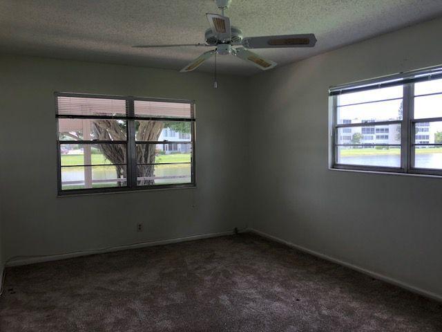 1061 Cornwall East, Unit 1061 Boca Raton, FL 33434 - Photo 9 of 23 Master Bedroom