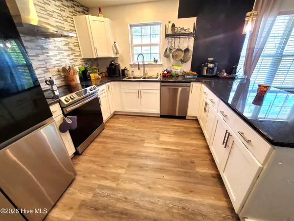 $199,000 | 2233 Locksley Woods Drive, Unit E, Greenville, NC 27858