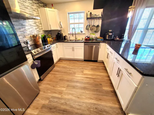 $199,000 | 2233 Locksley Woods Drive, Unit E, Greenville, NC 27858