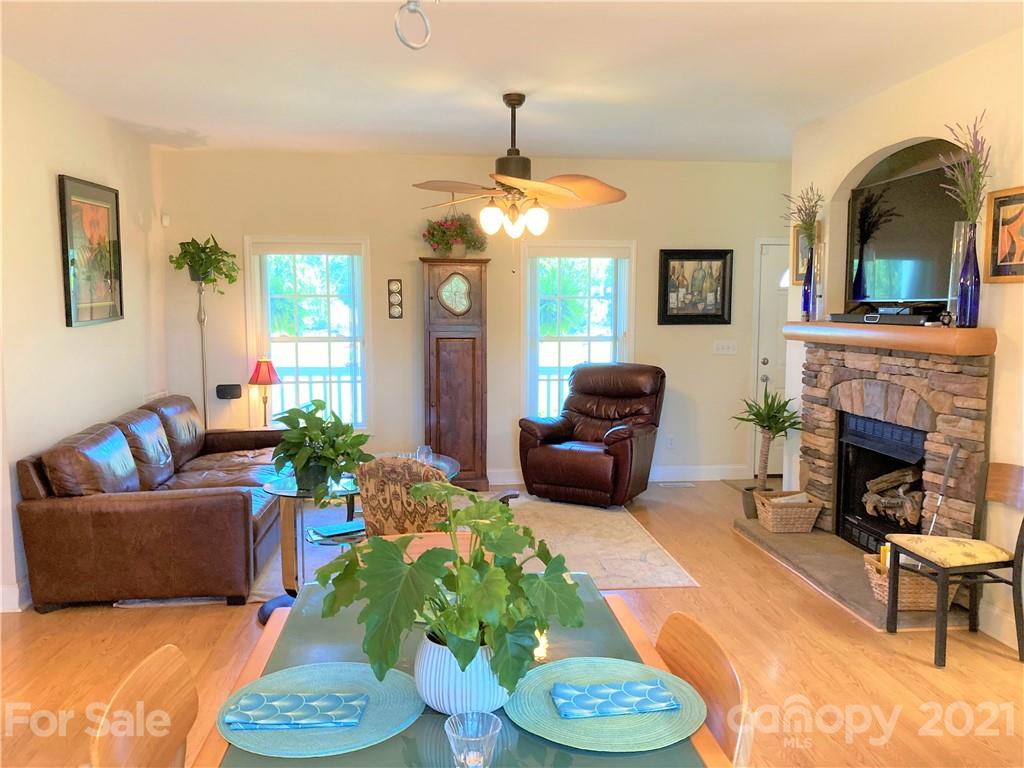 1821 Cove Road Rutherfordton, NC 28139 - Photo 2 of 46 a living room with furniture and a fireplace