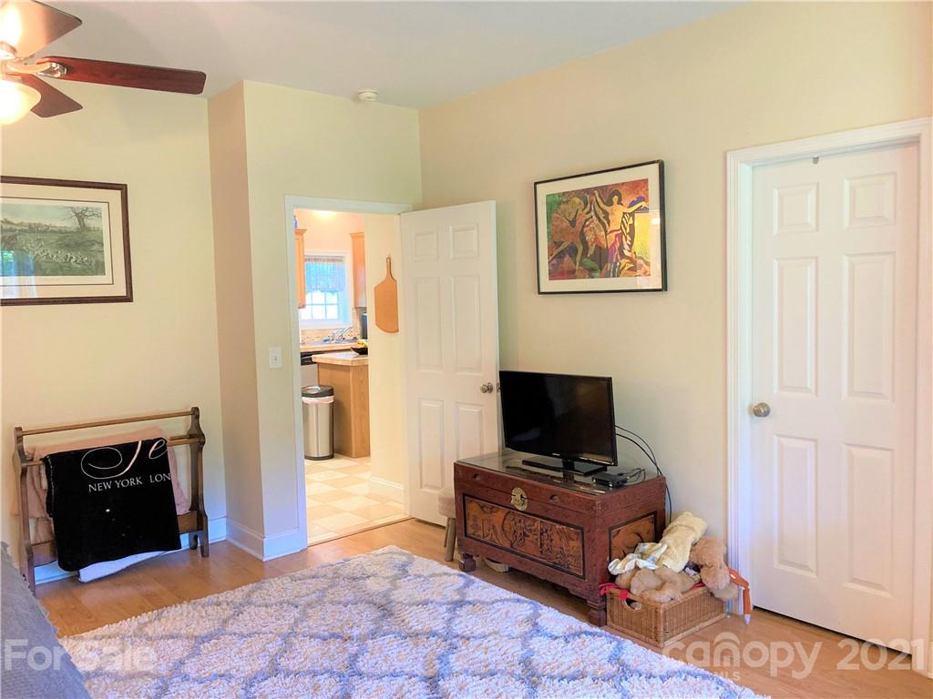 1821 Cove Road Rutherfordton, NC 28139 - Photo 21 of 46 a room with a bed and a television