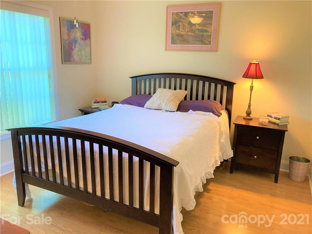 1821 Cove Road Rutherfordton, NC 28139 - Photo 25 of 46 a bed sitting in a bedroom next to a window