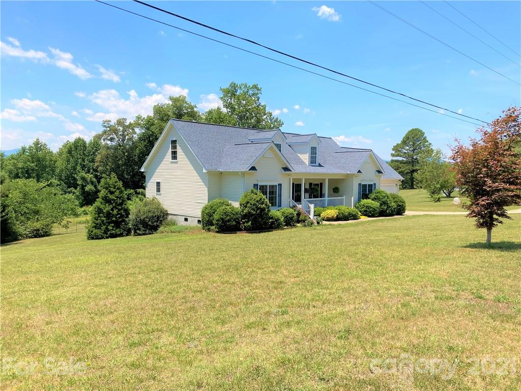 1821 Cove Road Rutherfordton, NC 28139 - Photo 40 of 46 a front view of a house with a yard