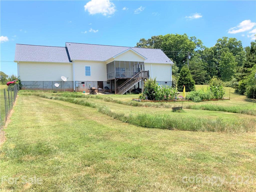 1821 Cove Road Rutherfordton, NC 28139 - Photo 42 of 46 a house view with swimming pool and yard
