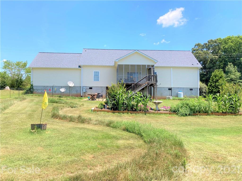 1821 Cove Road Rutherfordton, NC 28139 - Photo 43 of 46 a view of a house with a yard