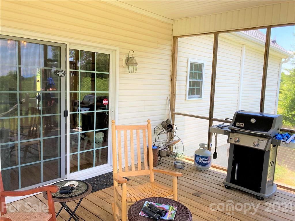 1821 Cove Road Rutherfordton, NC 28139 - Photo 6 of 46 a living room with furniture windows and wooden floor
