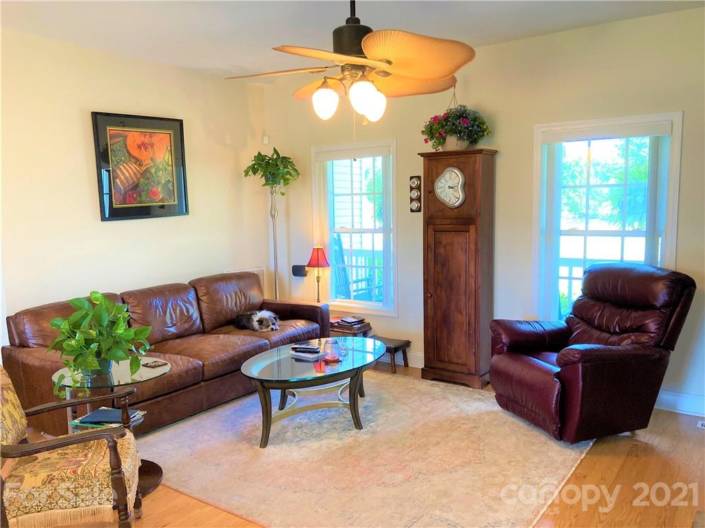 1821 Cove Road Rutherfordton, NC 28139 - Photo 8 of 46 a living room with furniture a window and a chandelier