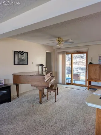 a living room with furniture and a table