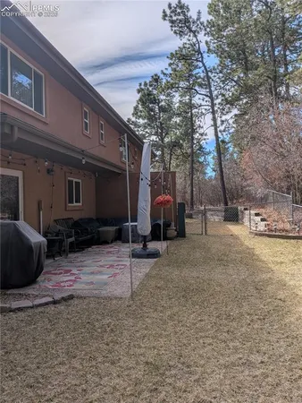 front view of a house with a small yard