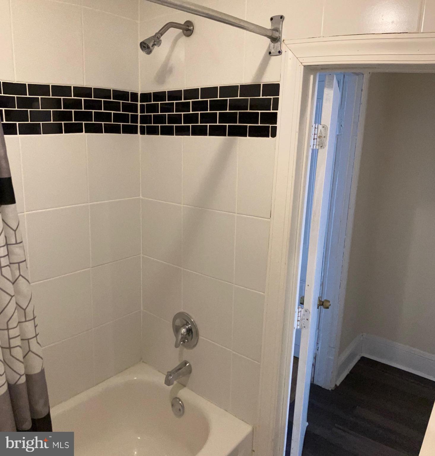 2215 Catharine Street, Unit 2 Philadelphia, PA 19146 - Photo 11 of 11 a bathroom with a shower and a sink