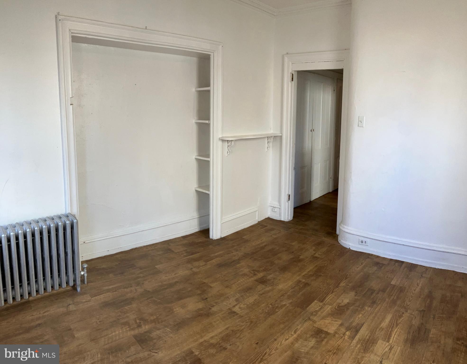 2215 Catharine Street, Unit 2 Philadelphia, PA 19146 - Photo 6 of 11 an empty room with closet area