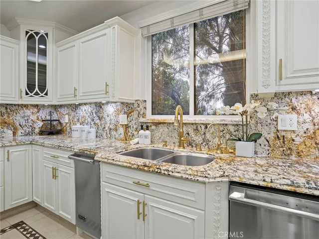 a view of a dining room with furniture large windows and wooden floor