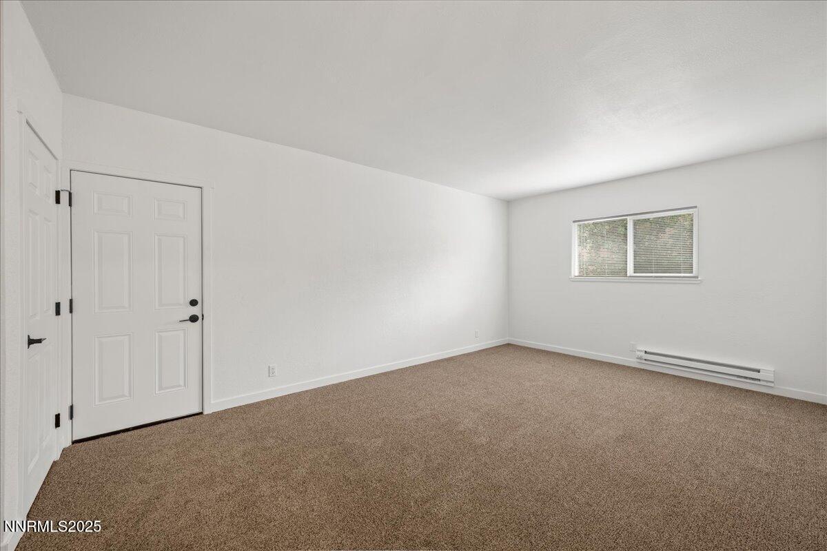 10038 Humite Lane Reno, NV 89506 - Photo 16 of 30 a view of an empty room with a window