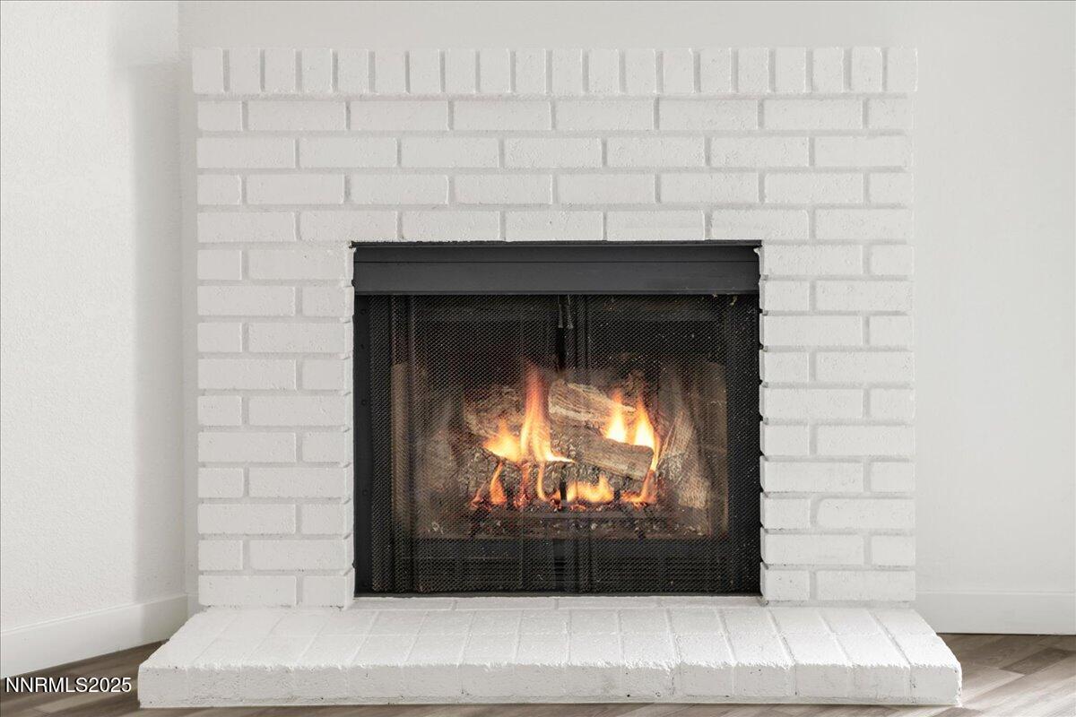 10038 Humite Lane Reno, NV 89506 - Photo 7 of 30 a room with a fireplace