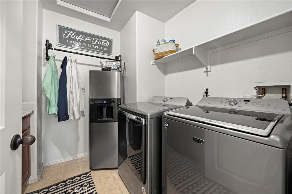 7357 Max Way Eastvale, CA 92880 - Photo 19 of 39 a utility room with dryer and washer