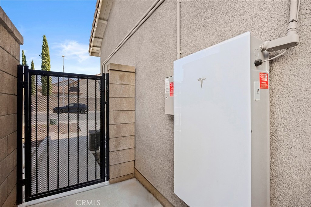 7357 Max Way Eastvale, CA 92880 - Photo 31 of 39 a utility room with gate