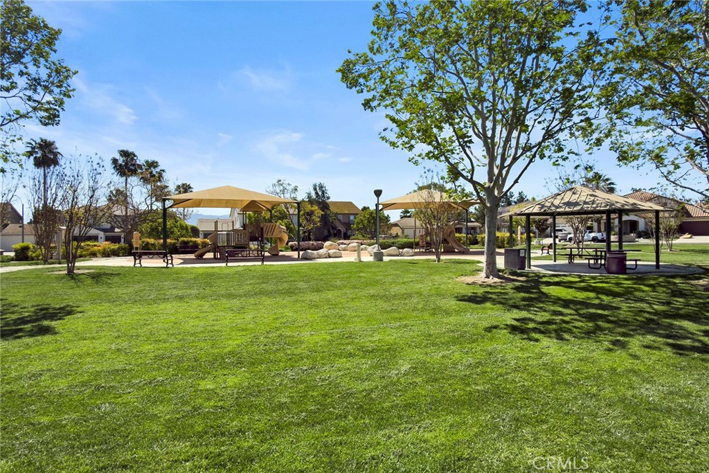 7357 Max Way Eastvale, CA 92880 - Photo 35 of 39 a view of a house with a big yard