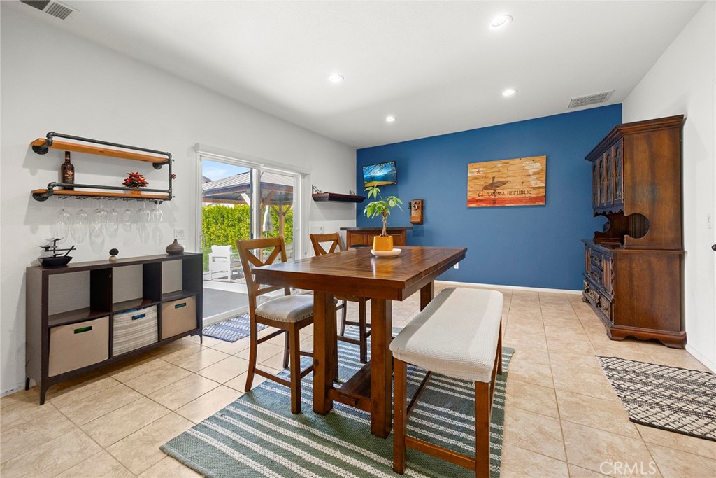 7357 Max Way Eastvale, CA 92880 - Photo 9 of 39 a workspace with furniture and window