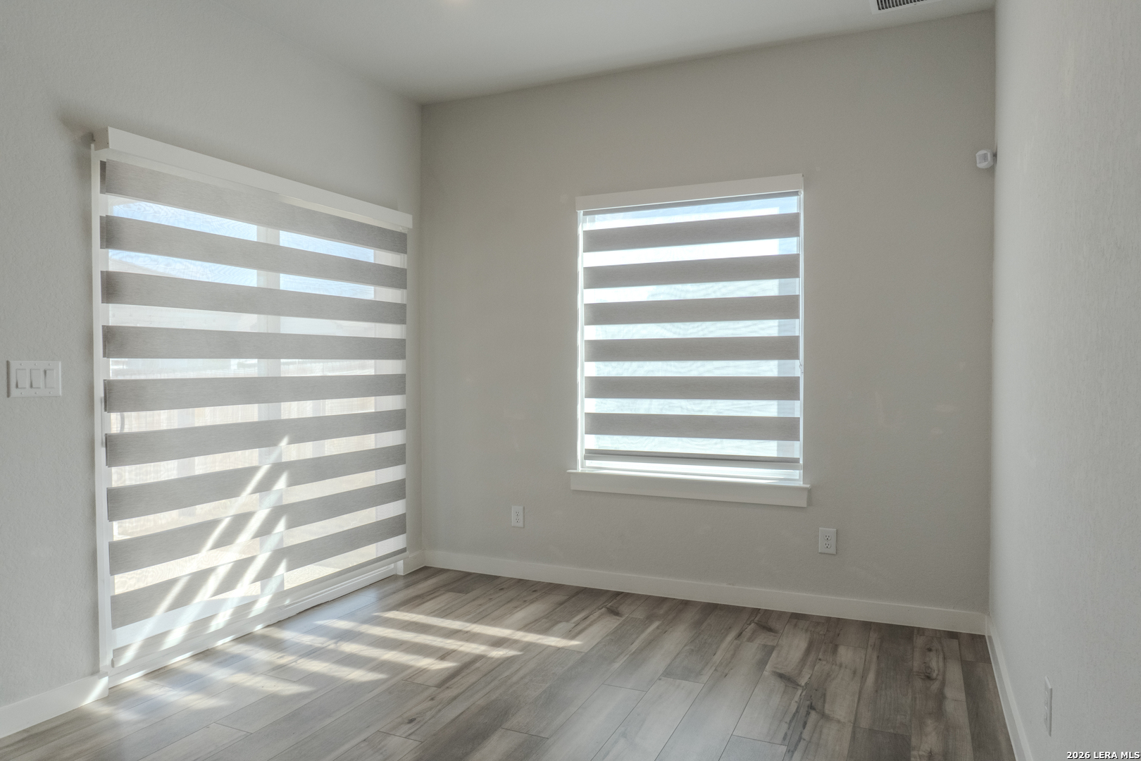 175 Ryan Crossing San Antonio, TX 78253 - Photo 12 of 37 a view of an empty room with a window